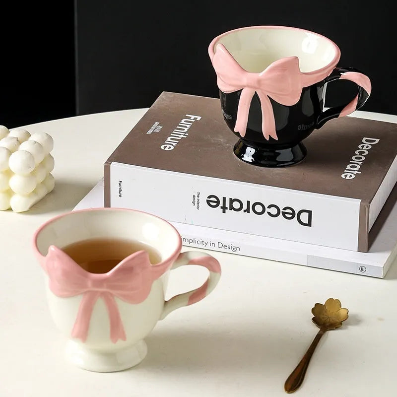 Ceramic mug with a girl heart bow design in white powder and black pink colour options