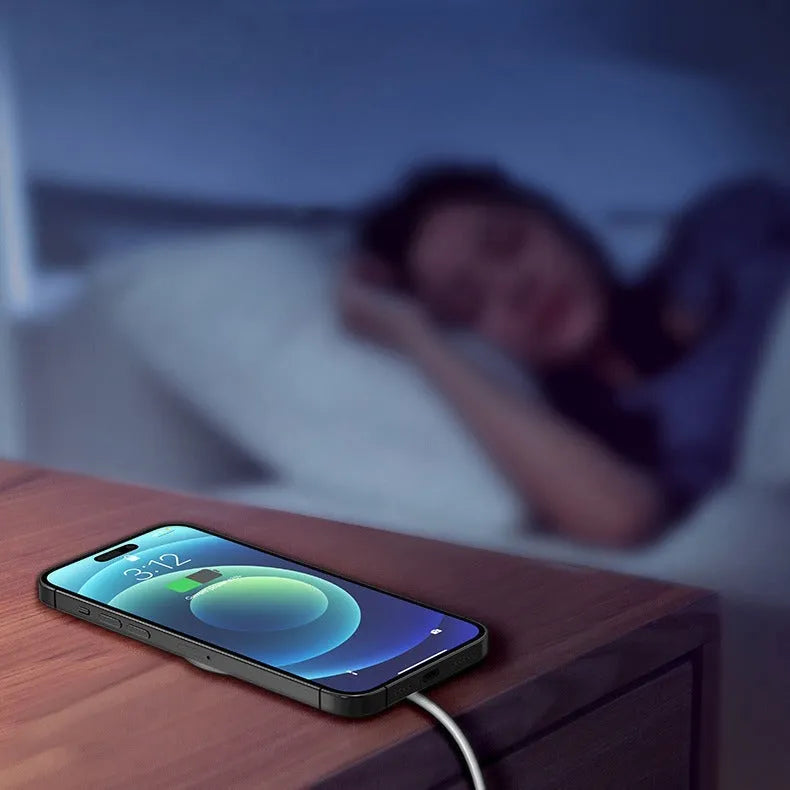White single magnetic wireless charger for universal mobile phone use with magnetic alignment pad