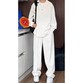 Men's apricot colour long sleeve polo shirt and trousers casual suit set on a hanger