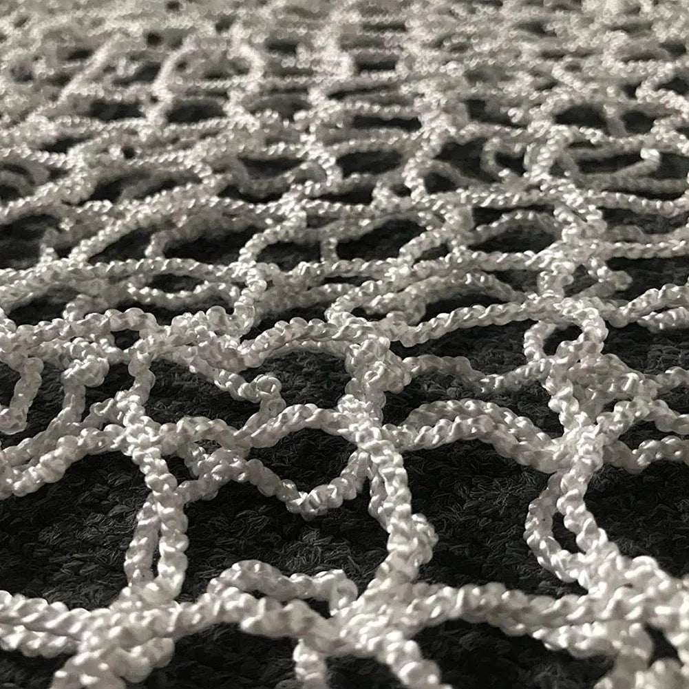 Black woven polyethylene rope hanging hay net for horses, showing the open grid pattern.