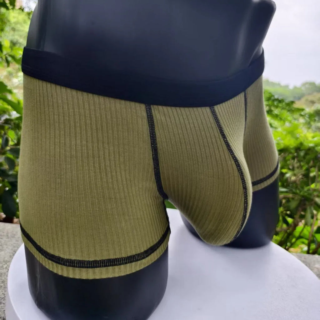 Men's solid colour breathable boxer shorts showing body shaping design in five colour options
