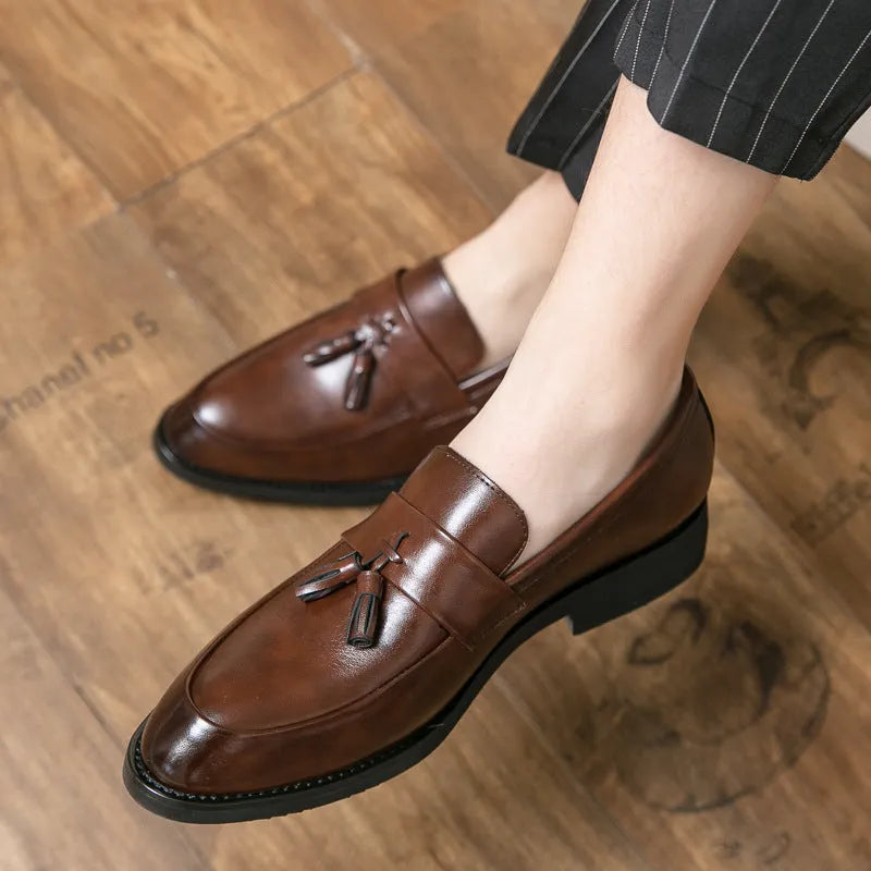 Men's black and brown tassel slip-on business casual shoes with a rubber sole