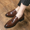 Men's black and brown tassel slip-on business casual shoes with a rubber sole