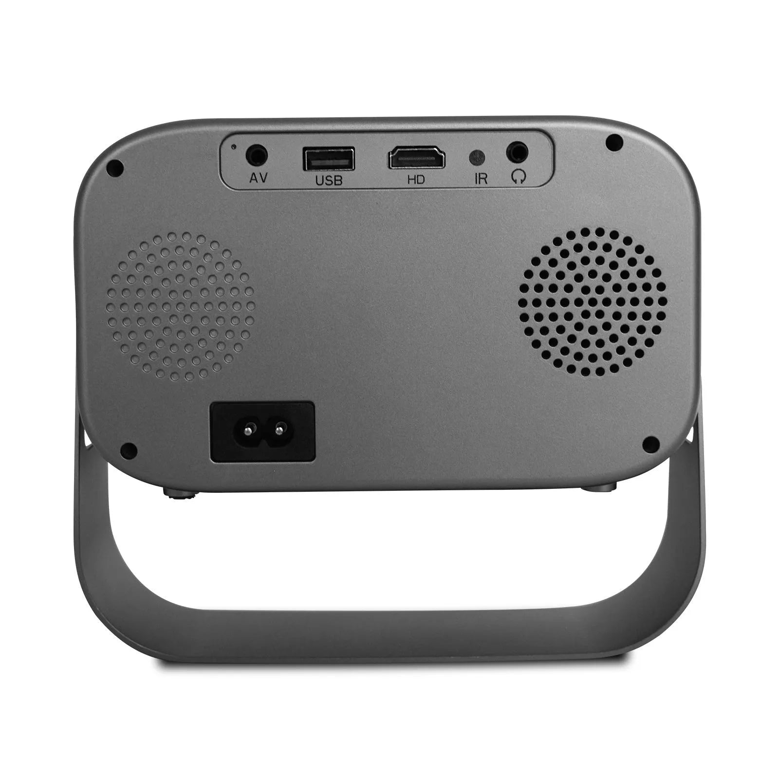 Black portable smart projector with remote control on table