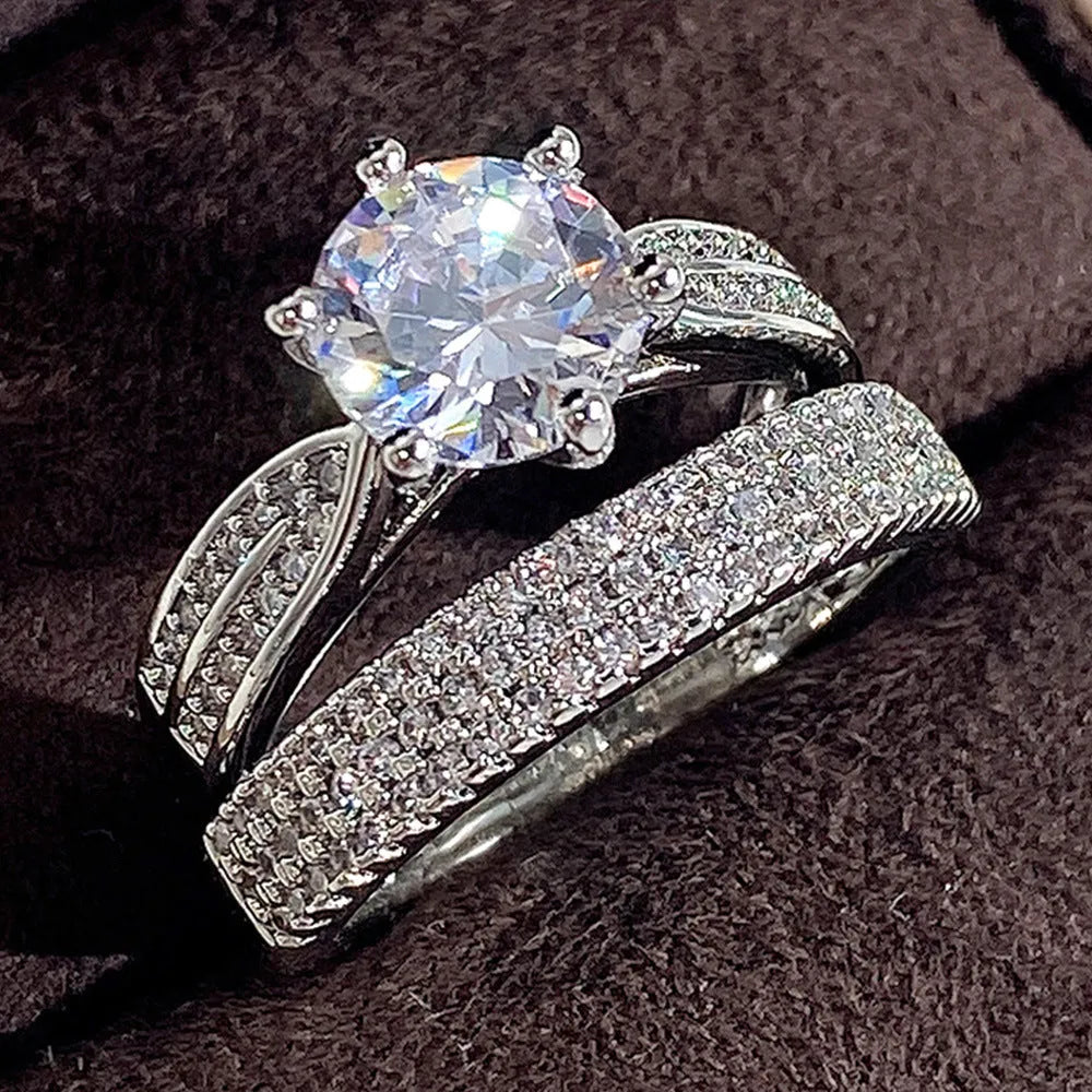 Geometric wedding ring bracelet in white gold colour showing round decorative elements