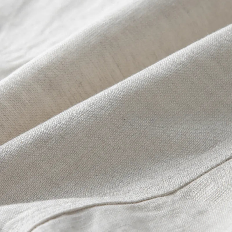 Men's casual linen suit jacket in solid colours showing loose fit and long sleeve design
