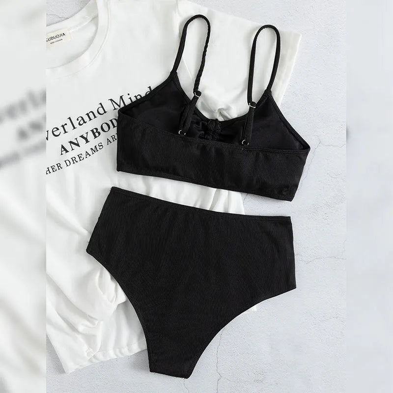 Black high-waisted women's bikini swimsuit with sling split design