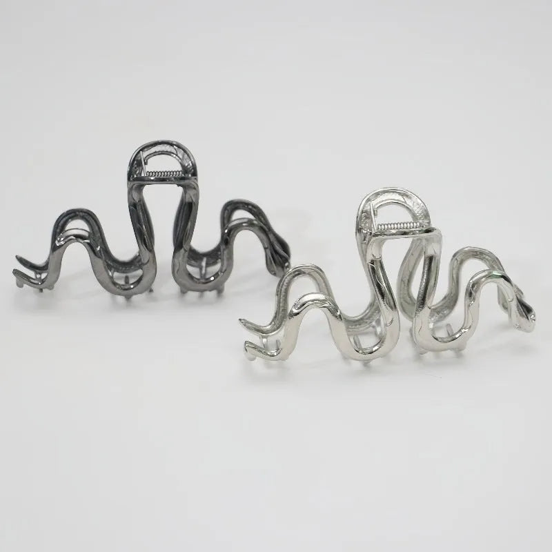 Slytherin serpent design metal hair barrette in silver or black, 10.5cm long.