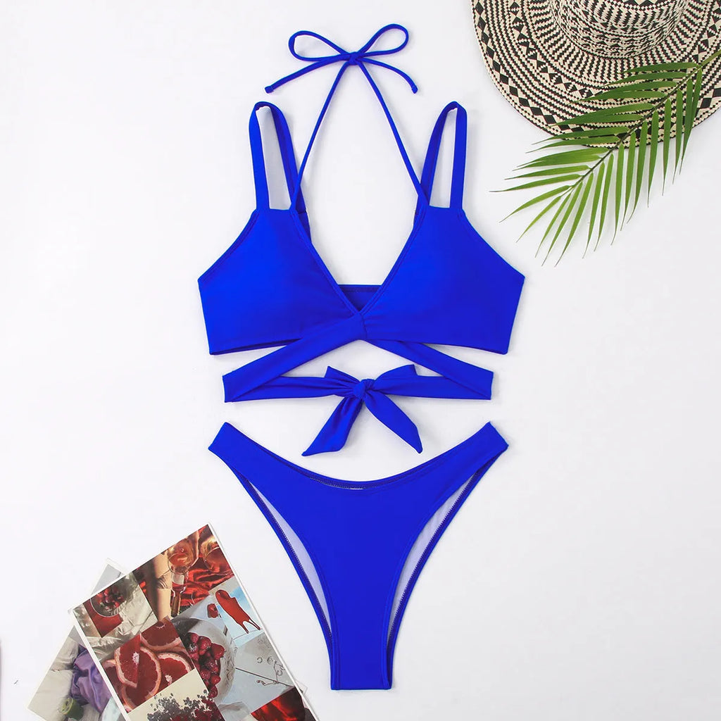 Women's solid colour strap bikini swimsuit showing briefs style in one of five colour options