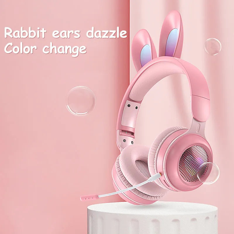 Wireless rabbit ear headphones with RGB LED ears in pink, foldable design on white background