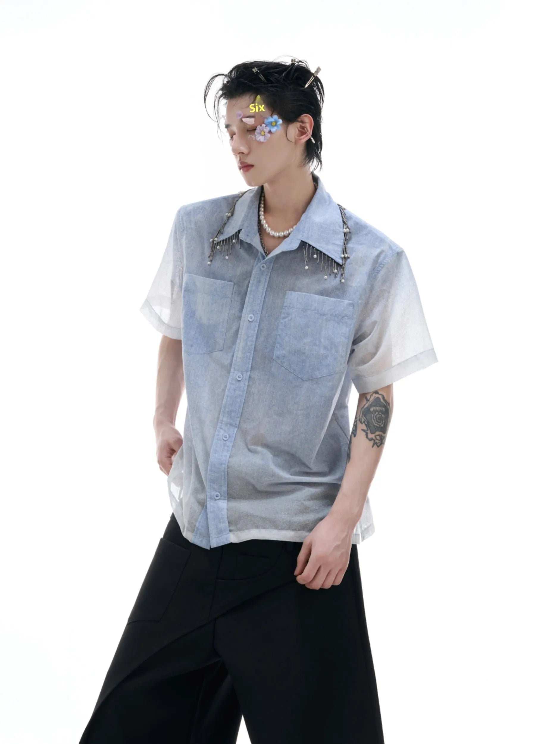 Men's blue and white gradient loose fit short sleeve casual shirt on a hanger.