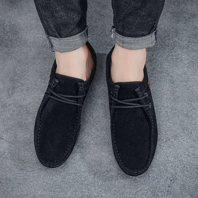 Men's casual slip-on loafers in brown with round toe, stitching, and non-slip plastic outsole