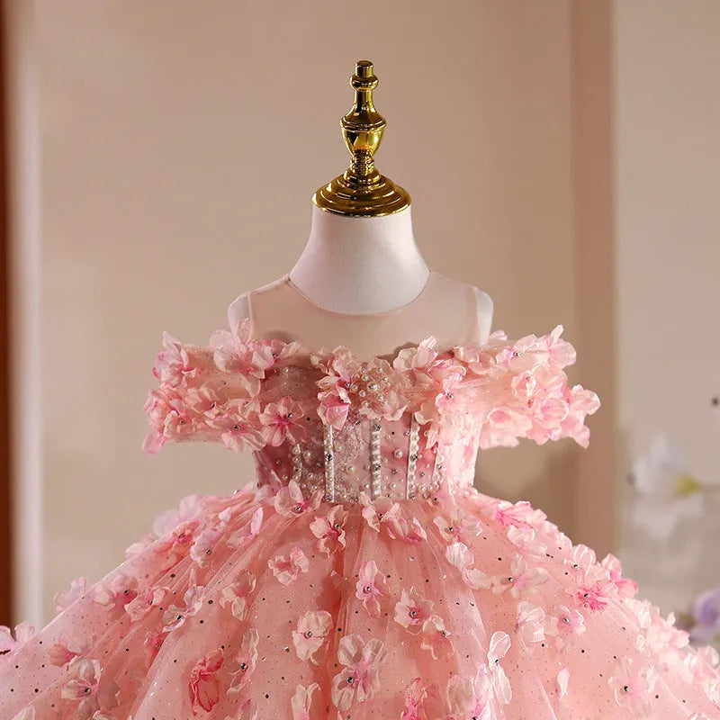 Girls pink polyester pettiskirt princess style dress on white background showing full skirt shape
