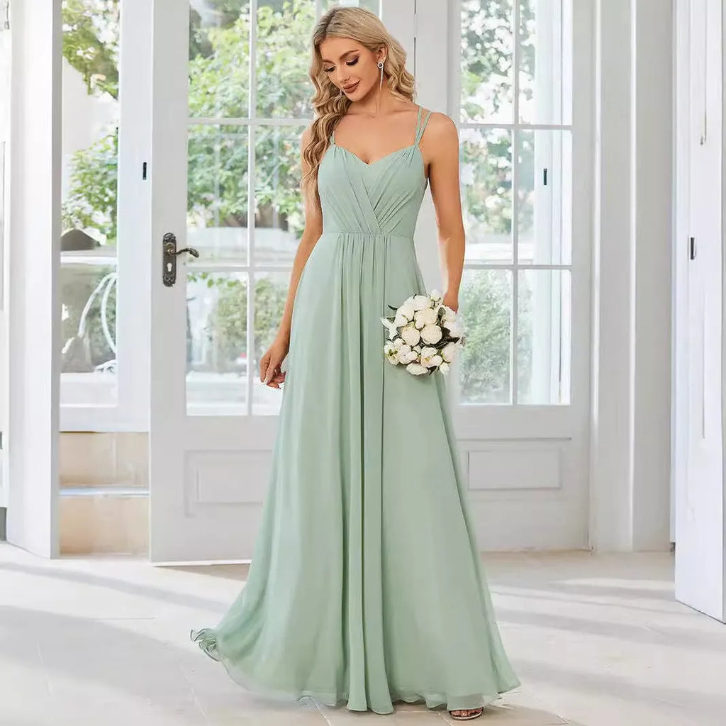 Women's sleeveless long A-line dress in polyester with pleated detailing, shown in light green colour