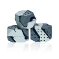 Two camouflage pattern silicone masseter exercise balls for facial muscle training in transparent box