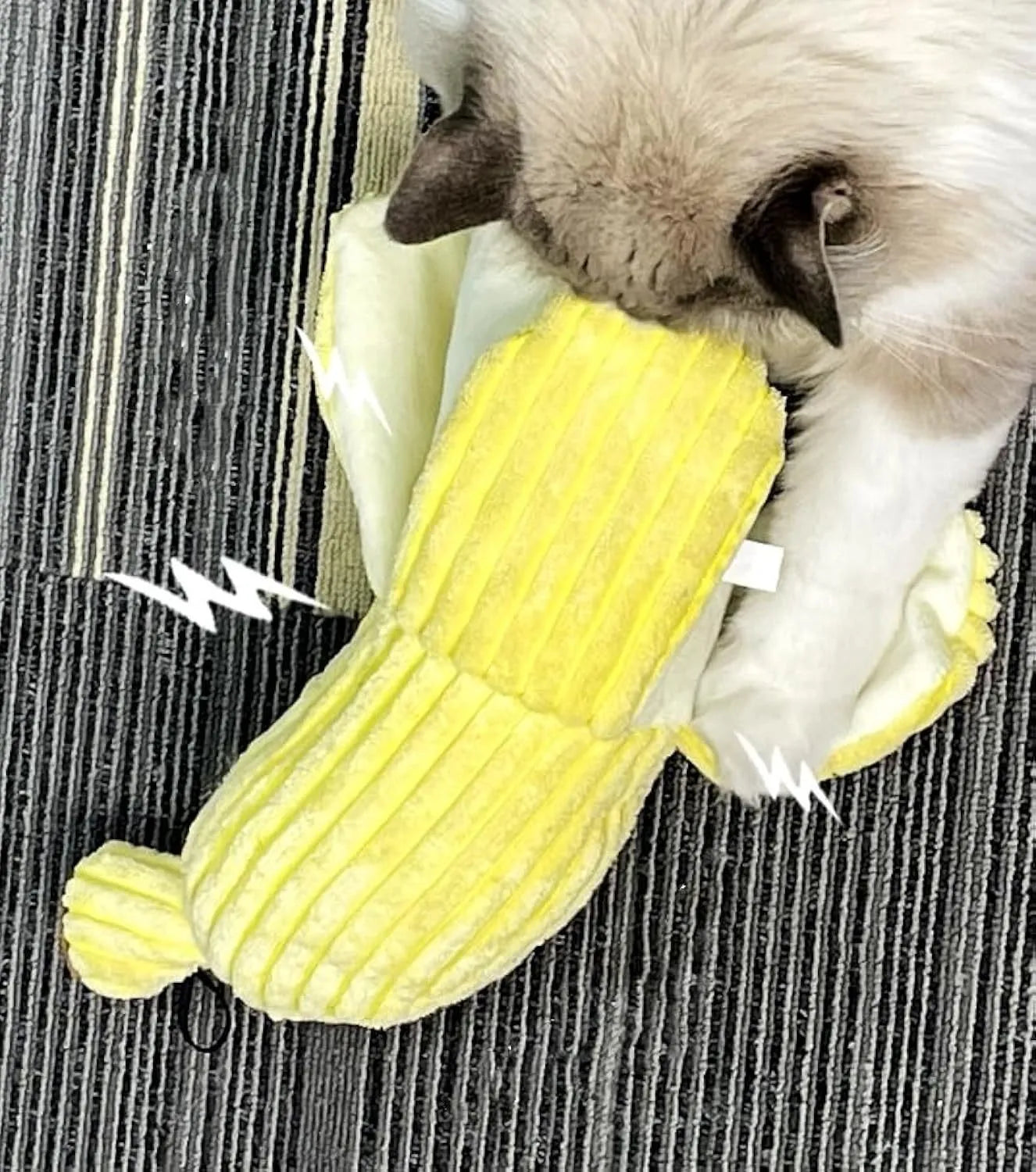 Yellow banana-shaped cat toy with soft plush texture and crinkle paper sound element