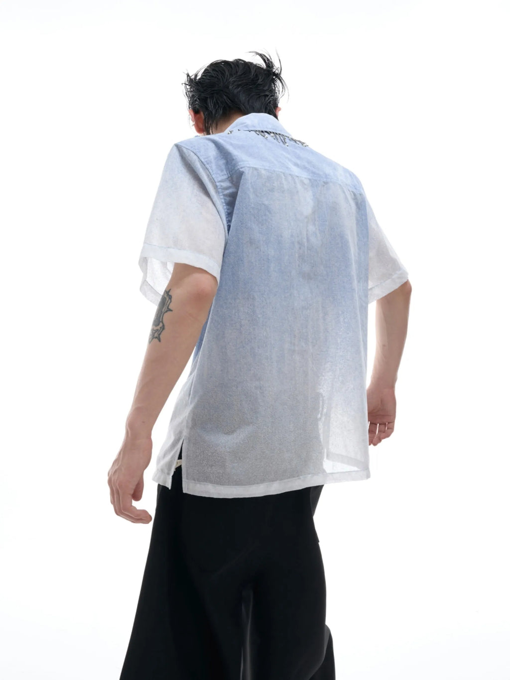 Men's blue and white gradient loose fit short sleeve casual shirt on a hanger.