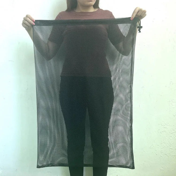 Black drawstring mesh storage bag shown in multiple sizes for toy organisation