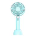 Blue handheld mini USB desktop fan with three speed settings showing compact design