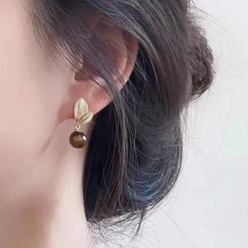 Alloy geometric stud earrings for women in colour 7400