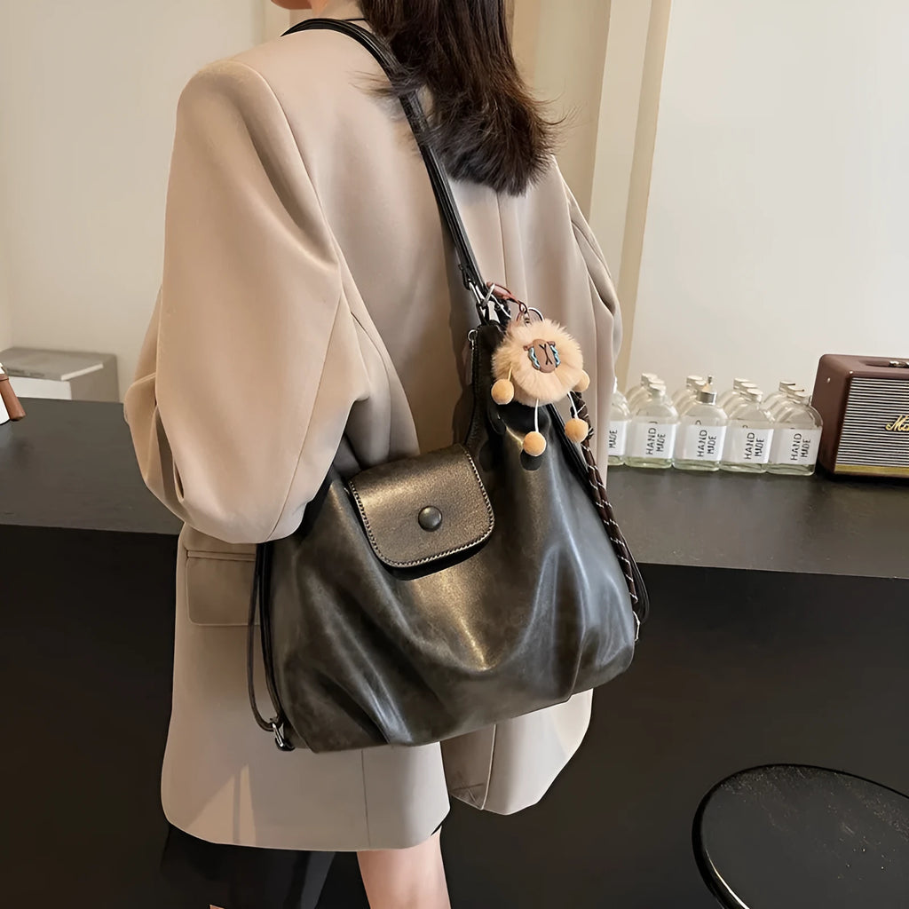 Women's PU leather shoulder bag with single strap in urban simplicity style showing horizontal square shape