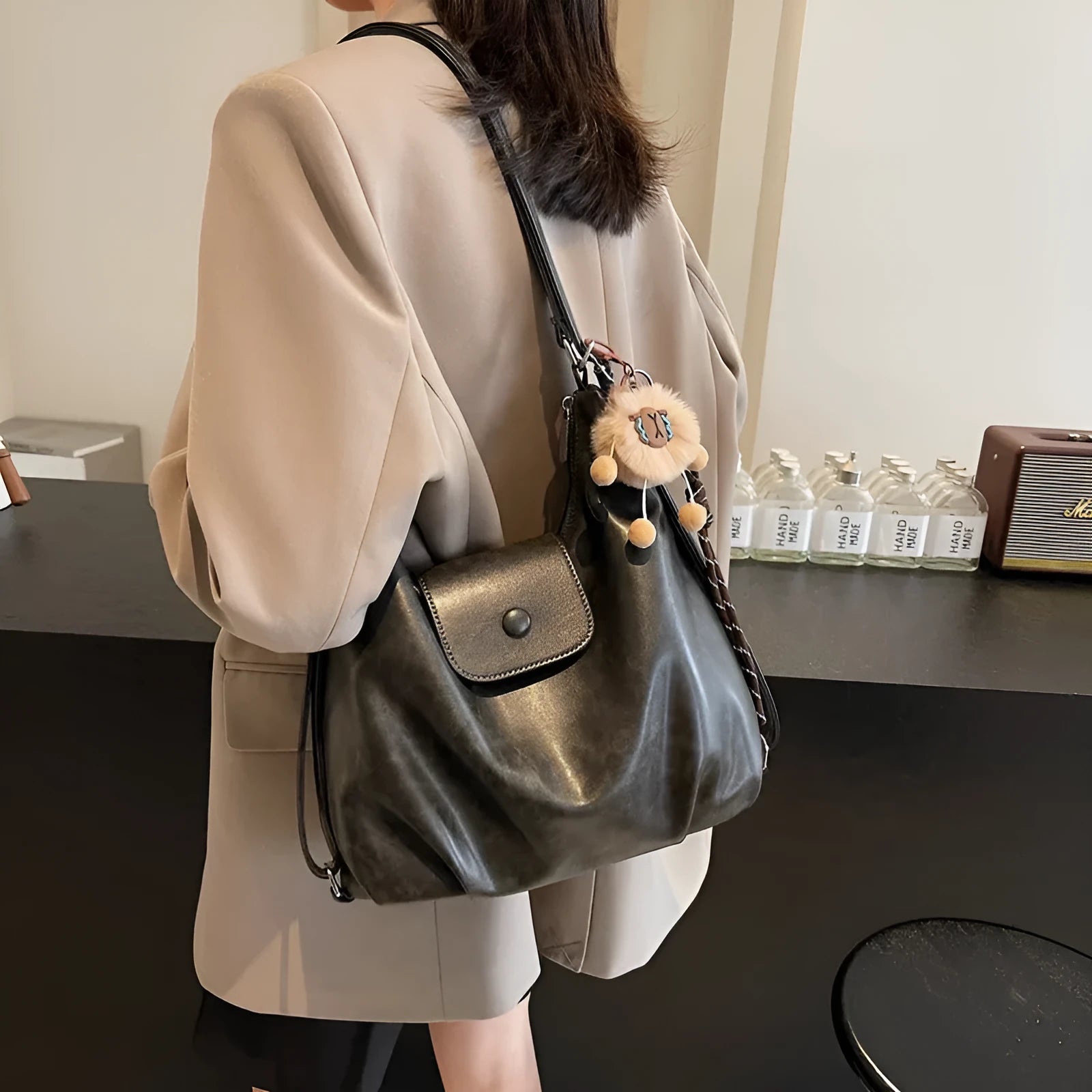 Women's PU leather shoulder bag with single strap in urban simplicity style showing horizontal square shape