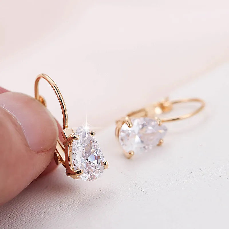 Women's drop-shaped copper earrings with gem inlay in gold and platinum colour options