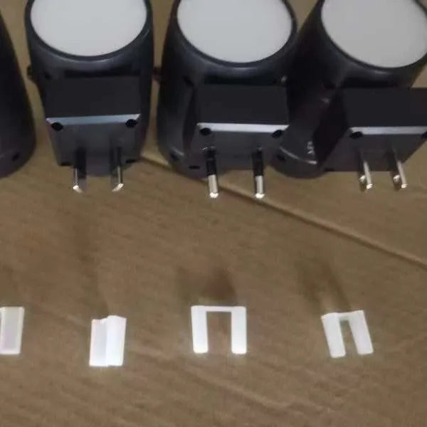 Rotatable small night light with brightness adjustment dial and direct plug design