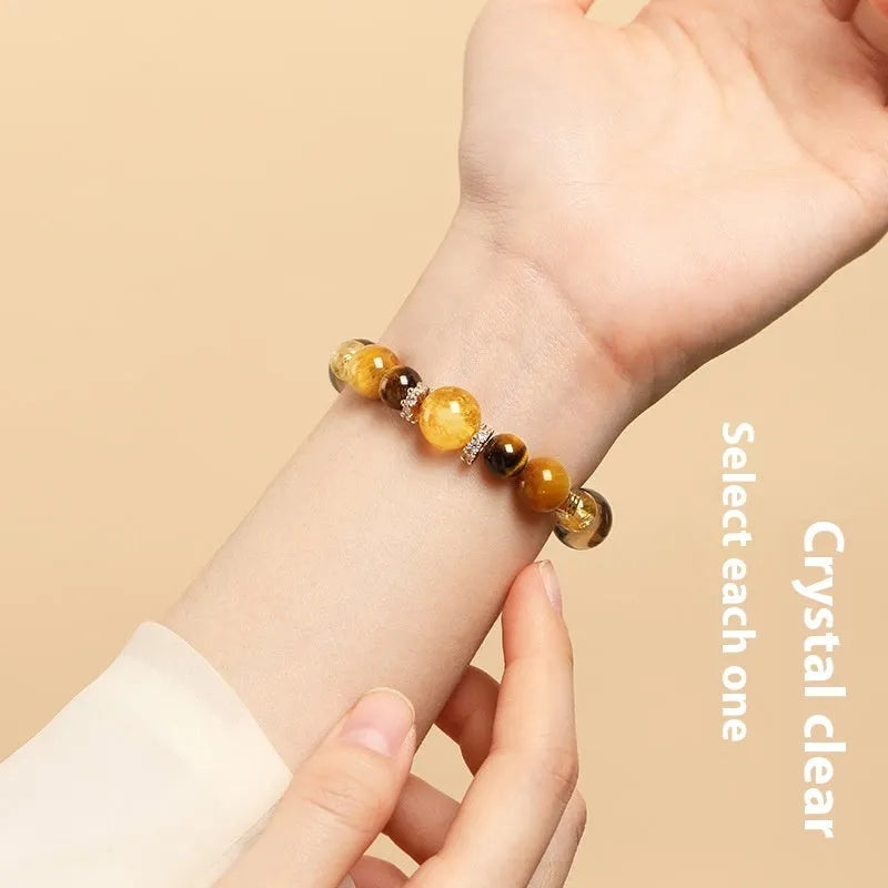 Yellow tower geometry tiger-eye crystal bracelet in 10mm and 12mm unisex sizes.