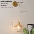 Retro brass bedside lotus wall lamp with glass shade in transparent finish, copper body, 22cm diameter