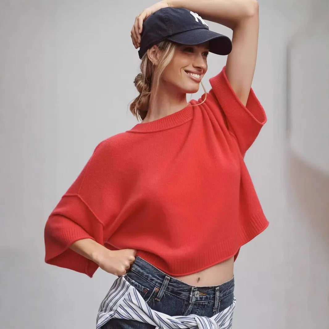 Red short viscose T-shirt with an exposed navel detail on a model, showing the regular sleeve and pullover style.