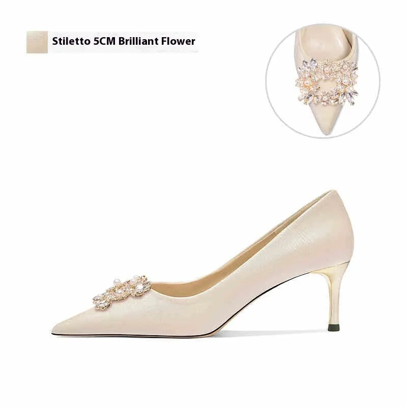 French crystal bridal high heels with rhinestone decoration and pointed toe in stiletto or cat heel styles