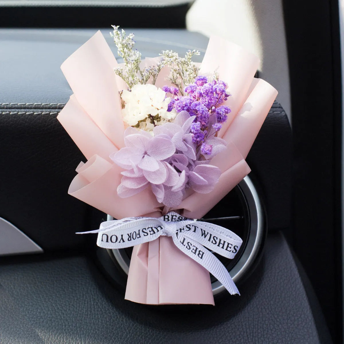 Handmade dried flower car air freshener ornament in multiple colours mounted on car vent