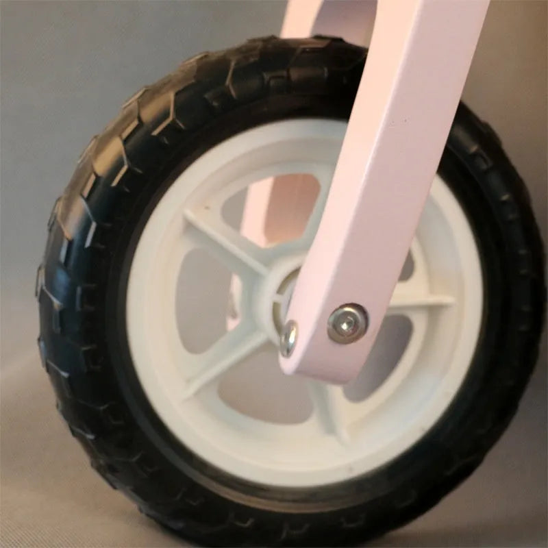 Pink wooden toddler balance scooter on wheels for children aged 1-6 years.