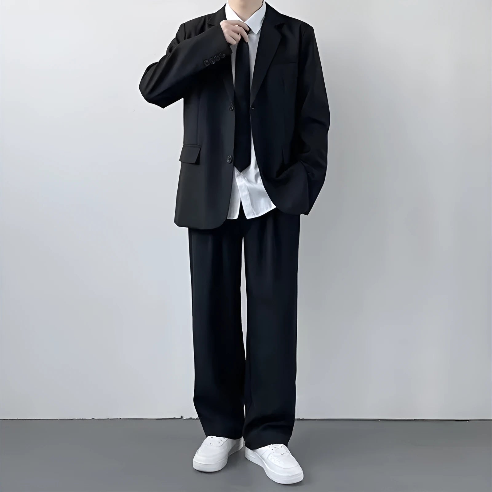 Plus size men's college style suit set with jacket, trousers, white shirt and tie on hanger
