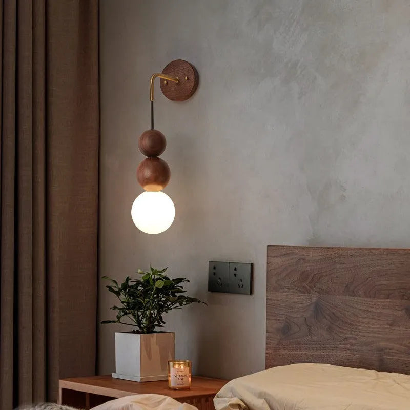 Wood and copper wall lamp with suspension wire and tri-colour light, 10cm diameter