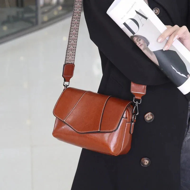 Leather women's casual zip crossbody bag in top grain leather, horizontal square shape, colour caramel
