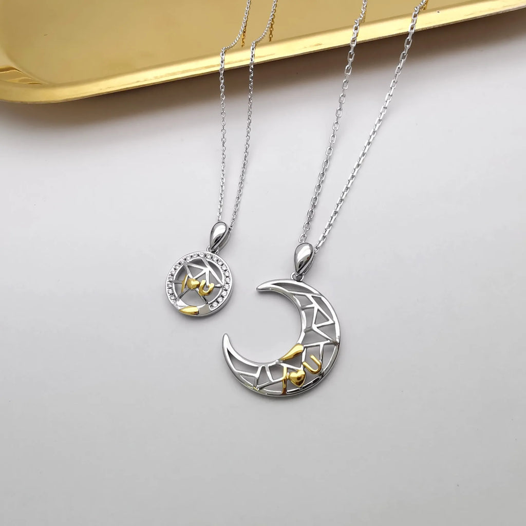 Sun and moon couple necklace with copper pendant on cross chain, showing male and female colour options