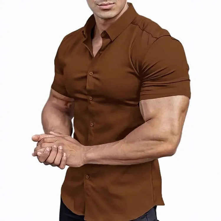 Man wearing a brown short sleeve casual printed shirt with a collar.