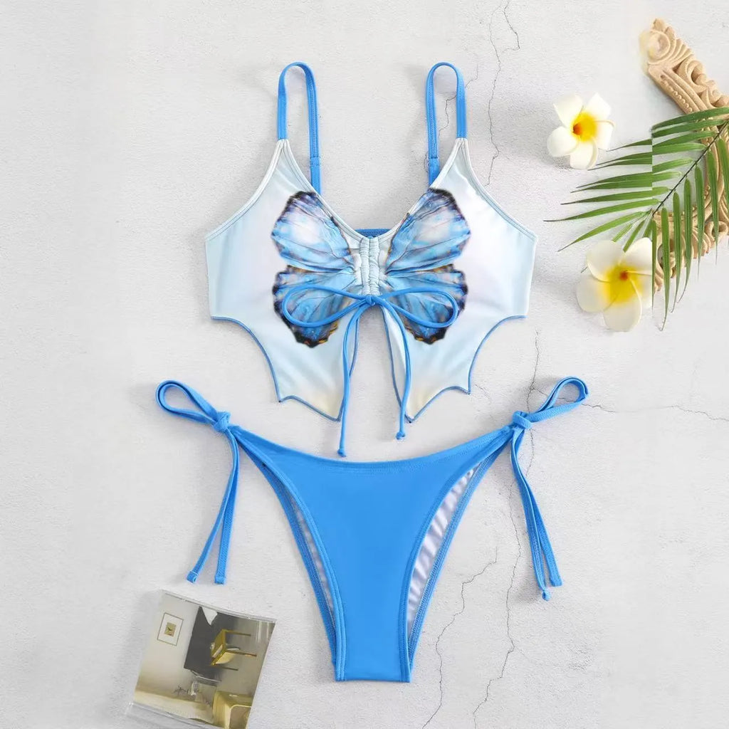 Women's purple bow ins style split bikini set with briefs, on a mannequin.