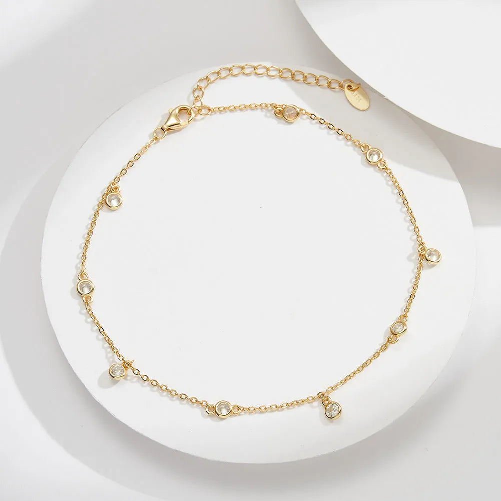 Silver anklet with geometric zirconium pendant in gold and platinum colour options
