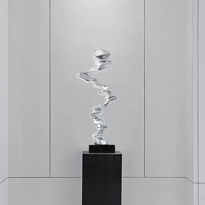 Modern minimalist abstract still life decorative ornament in gold, silver, or blue resin finish.