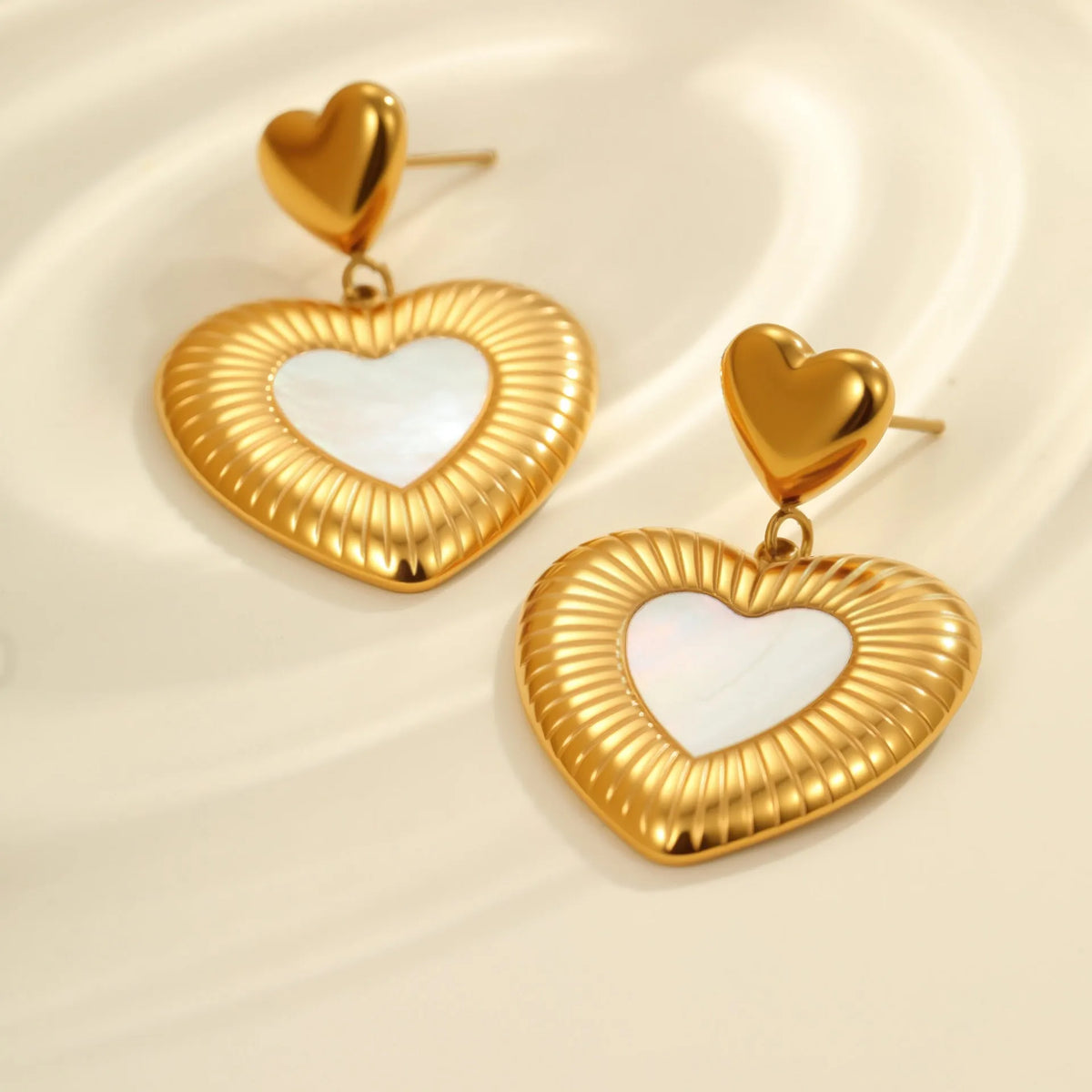 Gold-coloured heart-shaped stainless steel earrings with 18K electroplating for women