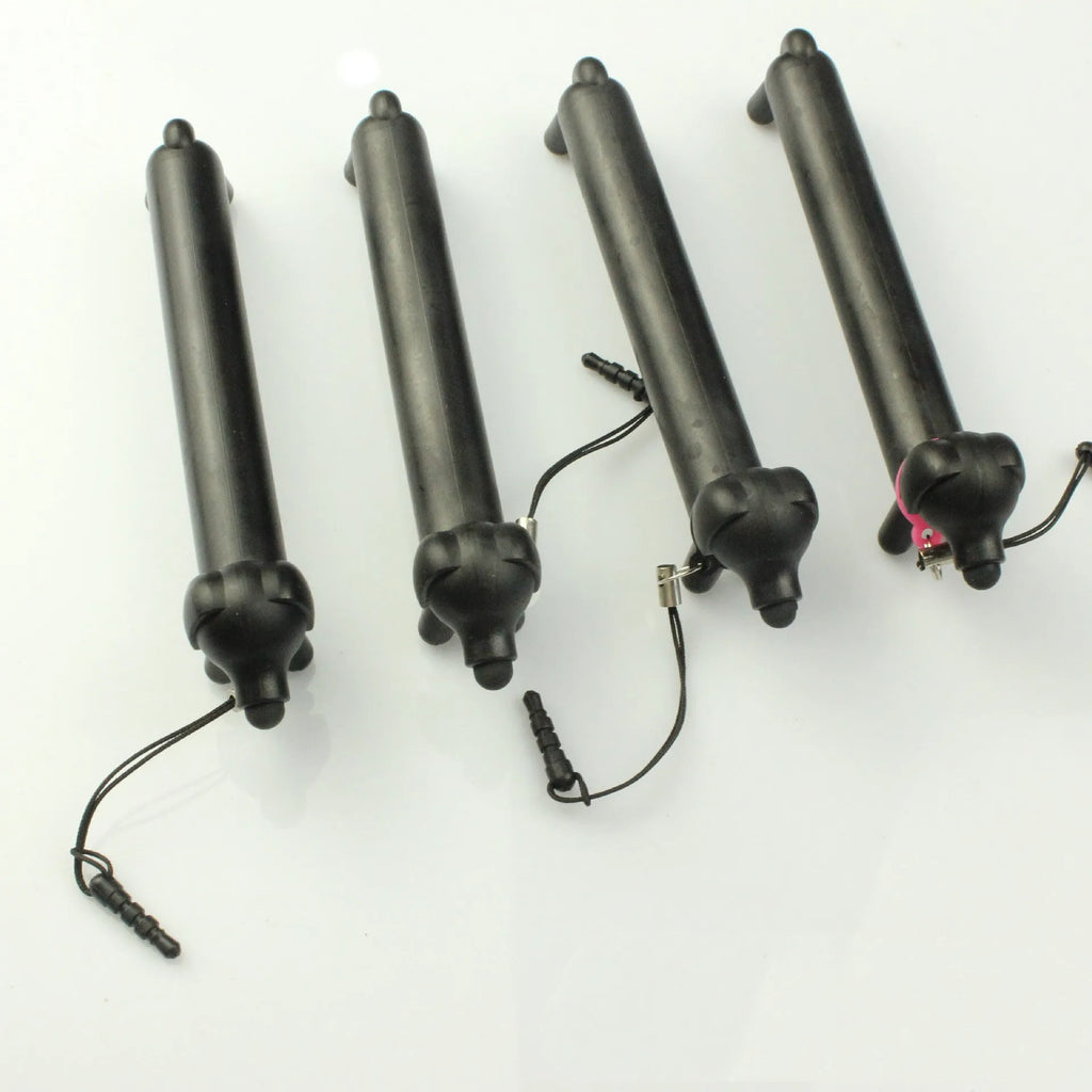 Black long puppy dog shaped touch screen stylus pen shown next to its carry socket
