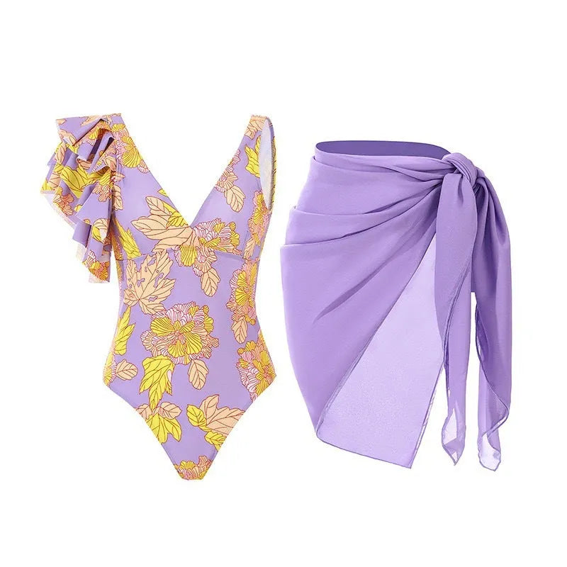 Women's solid colour one-piece swimsuit with spaghetti straps and matching removable skirt