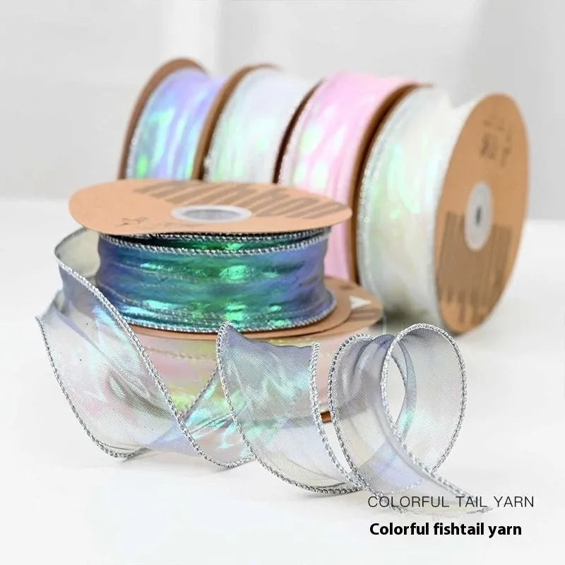 Fishtail yarn ribbon with wave-like mesh edges in multiple colour options for craft projects