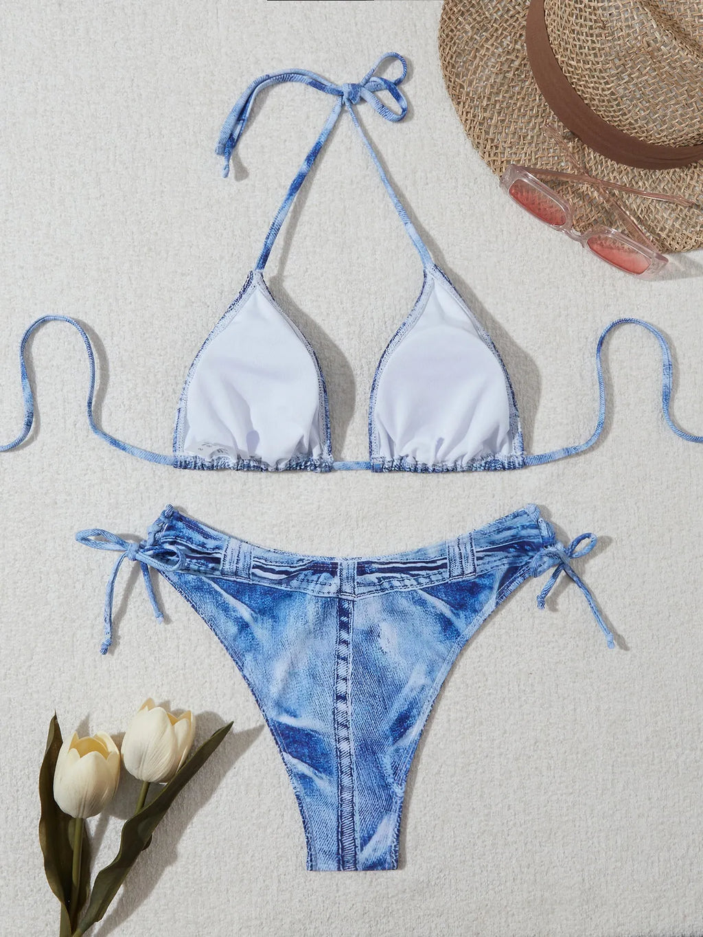 Women's denim blue printed bikini set with strap design, showing front and back views