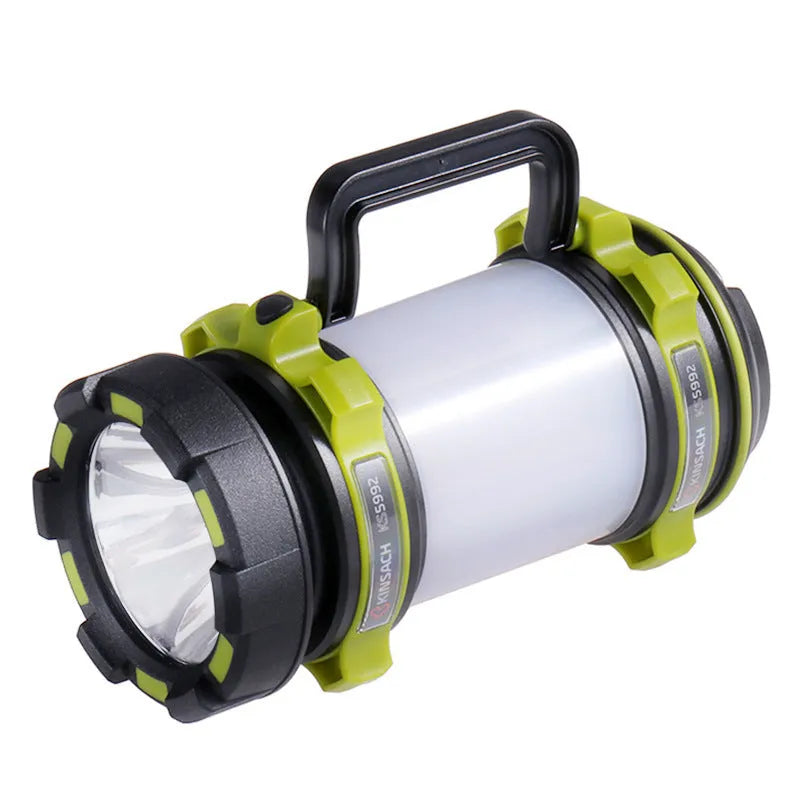Green KS-5992AC portable LED searchlight with 5W headlight and 3W side light on outdoor background