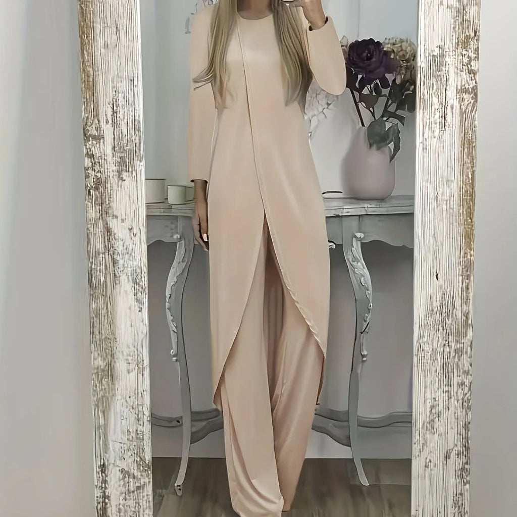 Loose fit casual tracksuit set in black, featuring a long sleeve round neck top and matching trousers