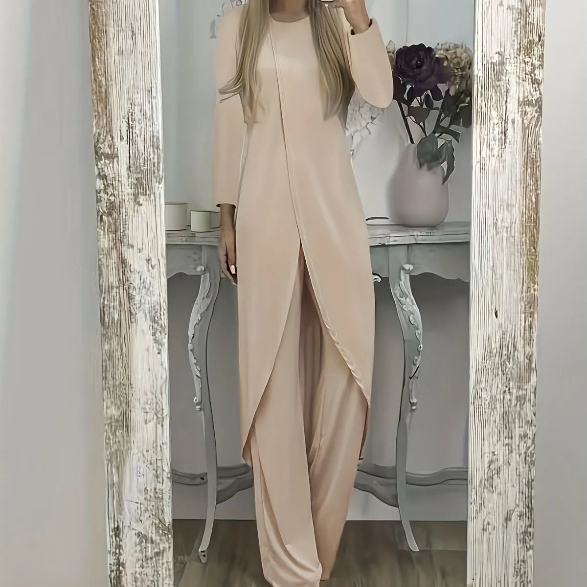 Loose fit casual tracksuit set in black, featuring a long sleeve round neck top and matching trousers